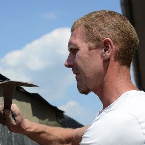 Zijkant-bekleden-met-shingles Dakdekker Oosterwolde met nokvorsten